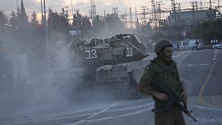 Israeli tanks move near the Israeli Gaza border, Israel, Wednesday, Oct. 11, 2023. (AP Photo/Erik Marmor)