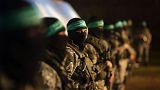 Palestinian members of the Ezzedine al-Qassam Brigades, the armed wing of the Hamas movement, take part in a gathering on January 31, 2016 in Gaza city