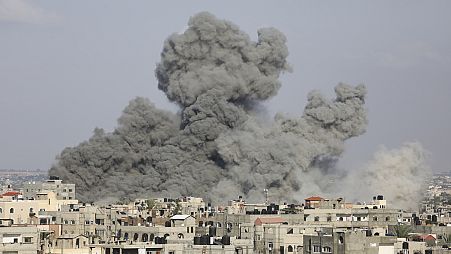 Smoke rises following Israeli airstrikes in Rafah, southern Gaza Strip on Thursday, Oct. 12, 2023.