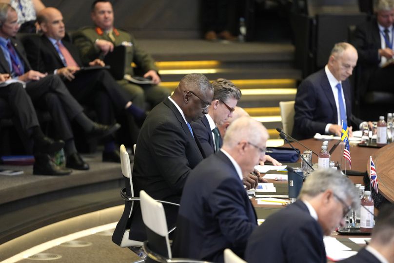 United States Secretary of Defense Lloyd Austin, centre, attends a meeting of the North Atlantic Council in defence ministers format at NATO headquarters in Brussels, Thursday