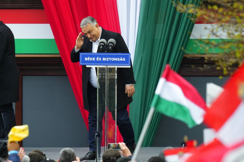 Prime Minister Viktor Orban greets his supporters prior to delivering a speech during the final electoral rally of his Fidesz party in Szekesfehervar, April 2022