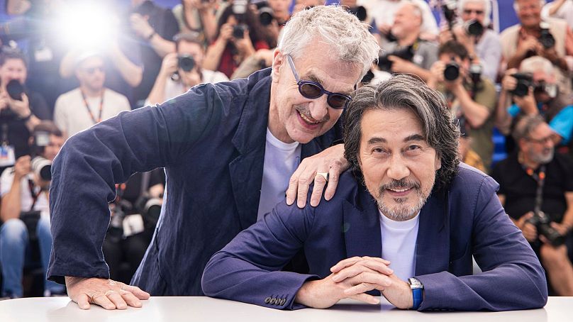 Director Wim Wenders, left, and Koji Yakusho pose for photographers at this year's Cannes Film Festival