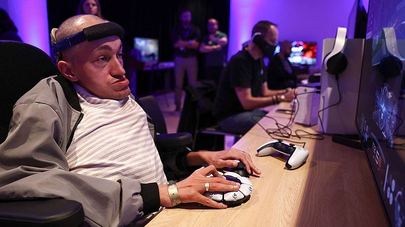 Jeremy Lecerf, also known as Mr Gyzmo, tries out the new Playstation Access controller at a demonstration event in London on 5 October 2023.
