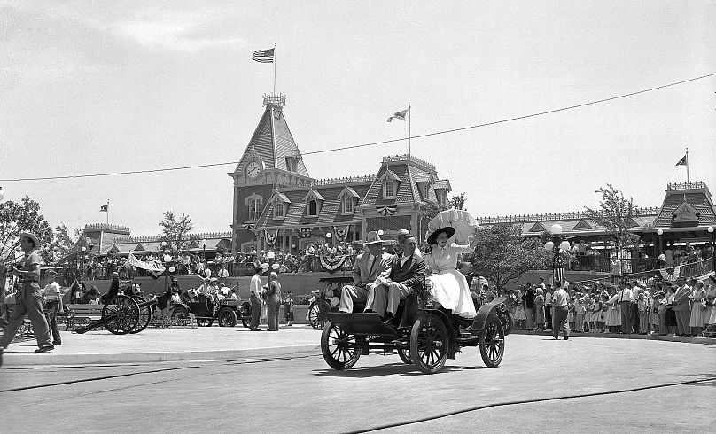 Disneyland opening day on July 17, 1955. Former California Governor Goodwin Knight (left), Walt Disney (center) and the governor's wife Virginia Knight (right).