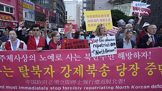 Güney Kore'de bir araya gelen insan hakları savunucuları, Çin'in Kuzey Koreli sığınmacıları yeniden ülkelerine teslim etmesini protesto etti