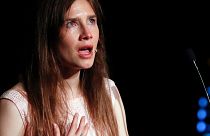 In this June 15, 2019 file photo, Amanda Knox gets emotional as she speaks at a Criminal Justice Festival at the University of Modena, Italy.