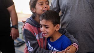 Children crying following Israeli raids in Khan Yunis, Gaza on Sunday