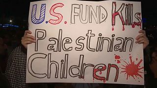 لافتة من المظاهرة من أمام الفارة الأمريكية-عمان-الأردن
