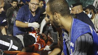 Раненые в результаты израильских авиаударов по городу Газа, 16 октября 2023 г.