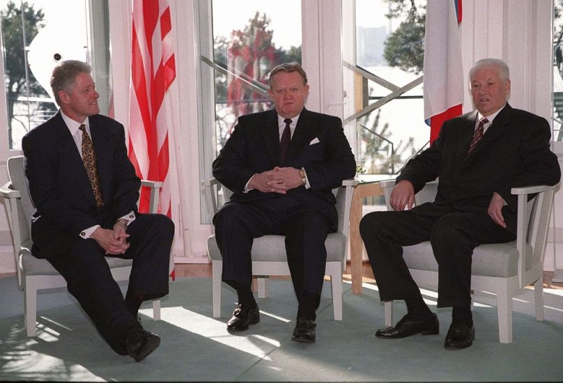 FILE: US President Bill Clinton, Finnish President Martti Ahtisaari, Russian President Boris Yeltsin Mantyniemi presidential residence March 21, 1997