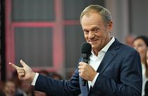 Donald Tusk, a former Polish prime minister addresses supporters at his party headquarters in Warsaw, Poland, Sunday, Oct. 15, 2023.
