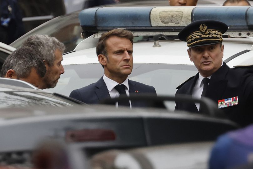 French President Emmanuel Macron arrives at the Gambetta high school in Arras.