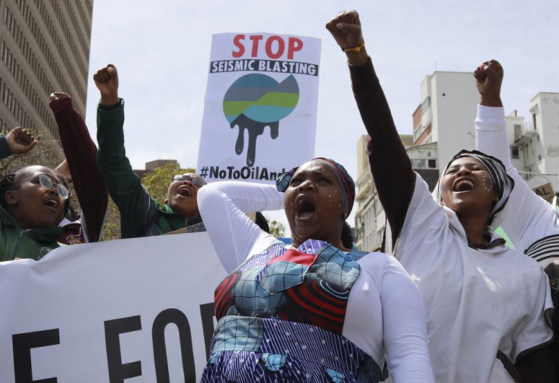 Environmental activists take part in a protest calling for the government to take immediate action against climate change in Cape Town, September 2022