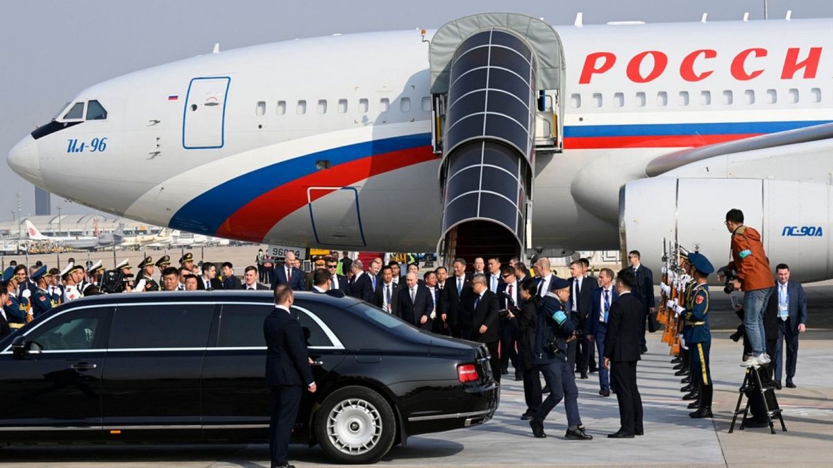 Vladimir Putin arrives at Beijing