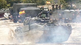 A Spanish armored vehicle drives during the NATO military exercises Crystal arrow 2022 at the Adazi military range, Latvia, March 11, 2022. 