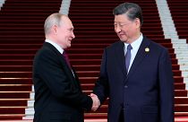 Vladimir Putin meets Xi Jinping in Beijing.