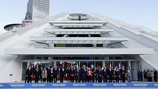 Leaders from EU and Western Balkans countries stand for a family photo in front of Pyramid Hall after Berlin Process Leaders' Summit in Tirana, Albania, Monday, Oct. 16, 2023.