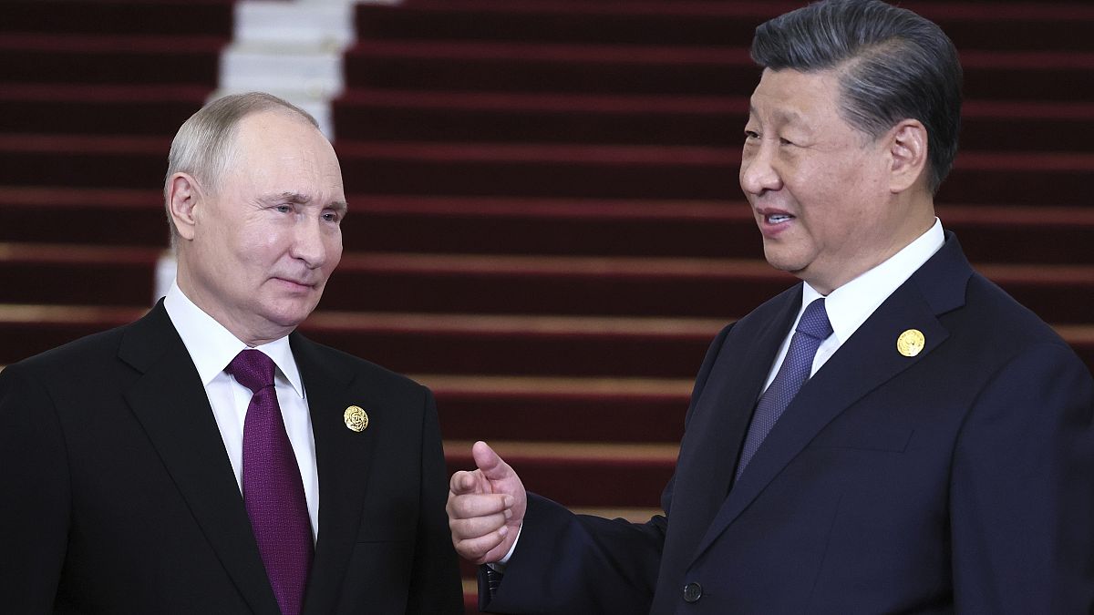 لقاء بوتين وجي شينبينغ