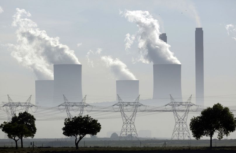 Steam billows from the chimneys at the coal-fired Lethabo power station in Vereeniging, South Africa, December 2018