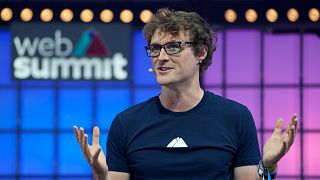 Paddy Cosgrave, CEO and founder of Web Summit, speaks at center stage during the opening of the Web Summit technology conference in Lisbon, Monday, Nov. 1, 2021. 