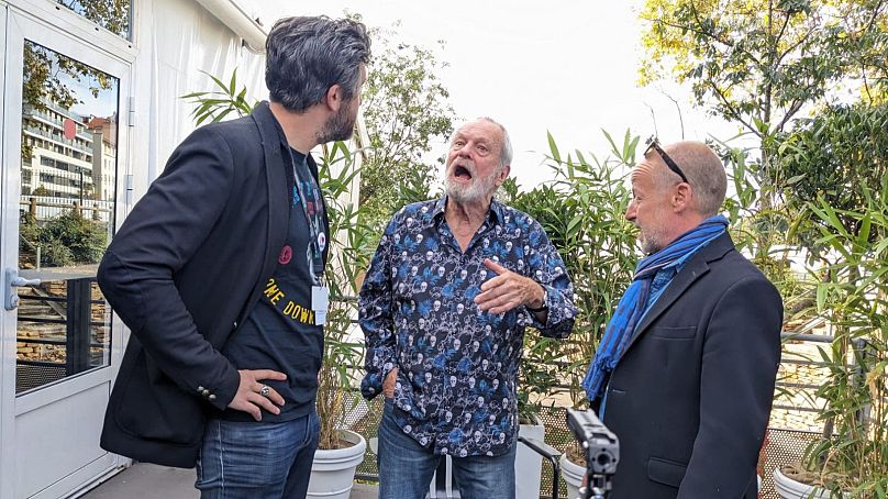 Terry Gilliam with Euronews Culture's David Mouriquand (left) and Fred Ponsard (right)
