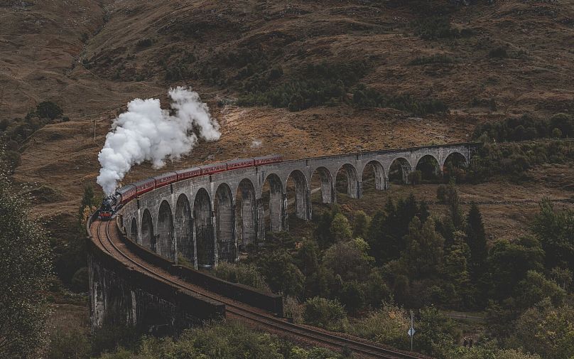 You can ride the real-life steam-powered Hogwarts Express through Scotland’s remote mountain landscapes and across the 21-arch Glenfinnan viaduct.