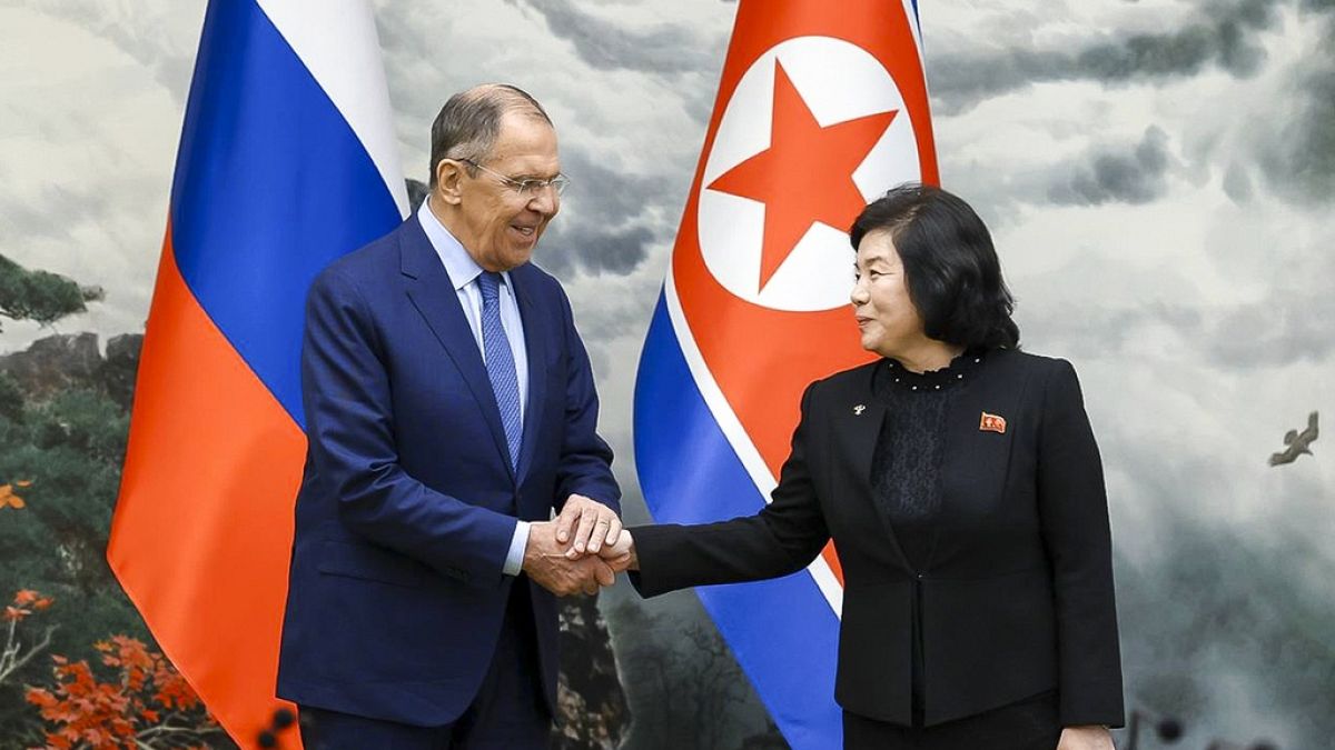 Russian Foreign Minister Sergey Lavrov, left, and North Korean Foreign Minister Choe Son Hui shake hands during their meeting in Pyongyang, North Korea, on Thursday, Oct. 19.