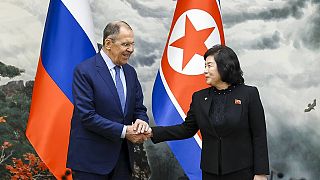 Russian Foreign Minister Sergey Lavrov, left, and North Korean Foreign Minister Choe Son Hui shake hands during their meeting in Pyongyang, North Korea, on Thursday, Oct. 19.