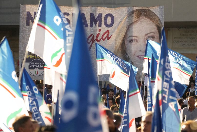 Supporters of right-wing populist Fratelli d'Italia attend a rally in central Rome, September 2022