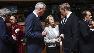 Spanish Economy Minister Nadia Calviño, pictured centre, speaks with her French and German counterparts: Bruno Le Maire (left) and Christian Lindner (right).