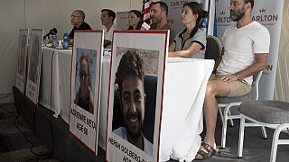 FILE - Relatives of U.S. citizens held hostage by Hamas militants attend a news conference on Oct. 10, 2023 in Tel Aviv, Israel