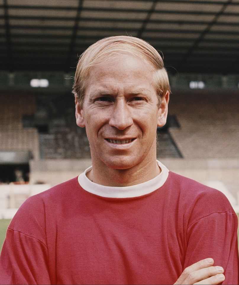 Bobby Charlton posed on the pitch at United's Old Trafford stadium in Manchester, England in July 1968 prior to the start of the 1968-69 football season