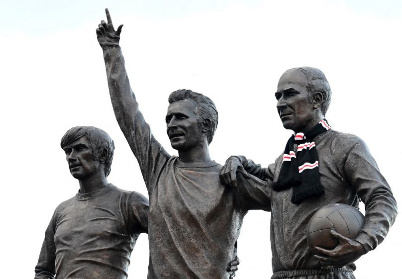 Statute mit Bobby Charlton, George Best und Denis Law