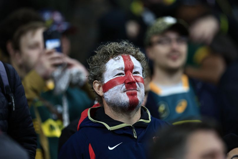 An England supporter watches at the end of the Rugby World Cup semifinal match between England and South Africa at the Stade de France