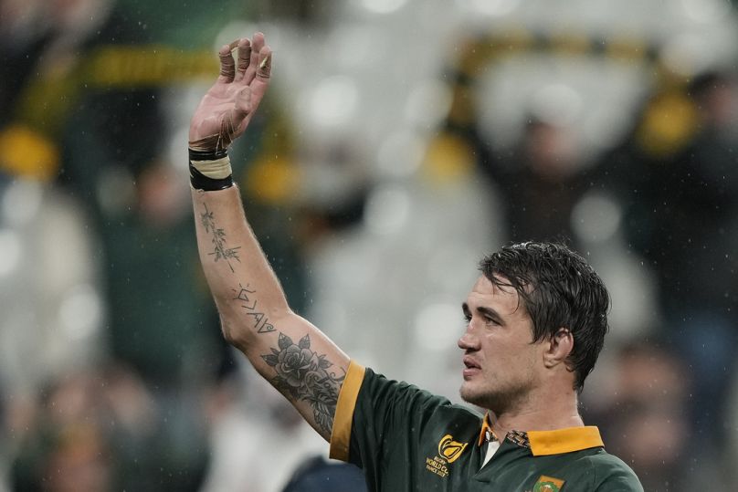 South Africa's Franco Mostert waves to the crowd after their 16-15 defeat of England in the Rugby World Cup semifinal match at the Stade de France