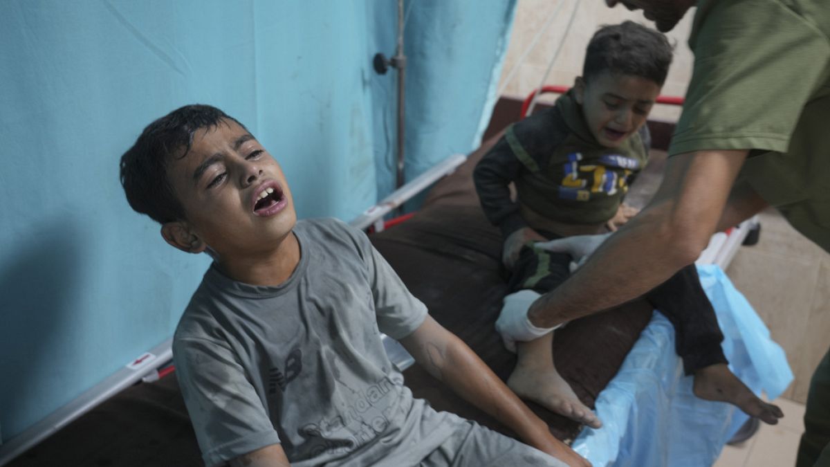 Palestinians wounded in Israeli bombardment wait for treatment in a hospital in Deir al-Balah, south of the Gaza Strip.