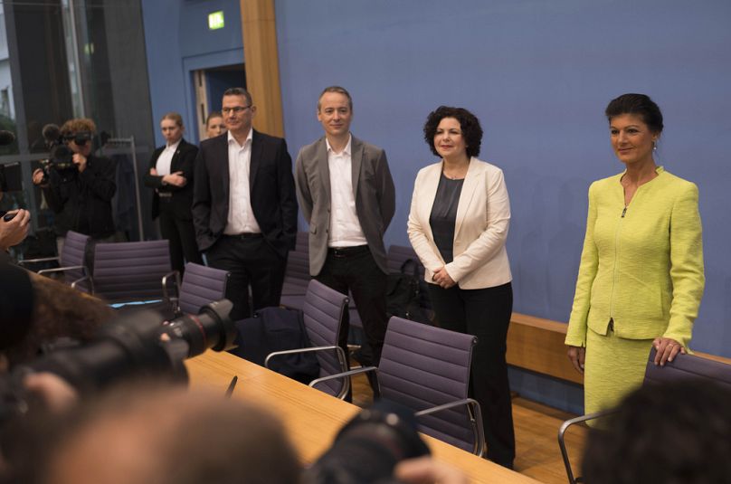 Ralph Suikat, Lukas Schoen, Amira Mohamed Ali and Sahra Wagenknecht arrive for a news conference to announce the founding of a precursor to a new party in Berlin, Germany, Mon