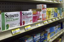 Sudafed and other common nasal decongestants containing pseudoephedrine are on display behind the counter at Hospital Discount Pharmacy in Edmond, Oklahoma in the US in 2005.