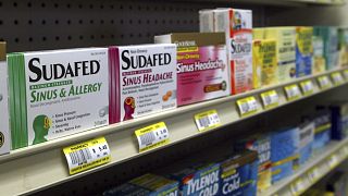 Sudafed and other common nasal decongestants containing pseudoephedrine are on display behind the counter at Hospital Discount Pharmacy in Edmond, Oklahoma in the US in 2005.