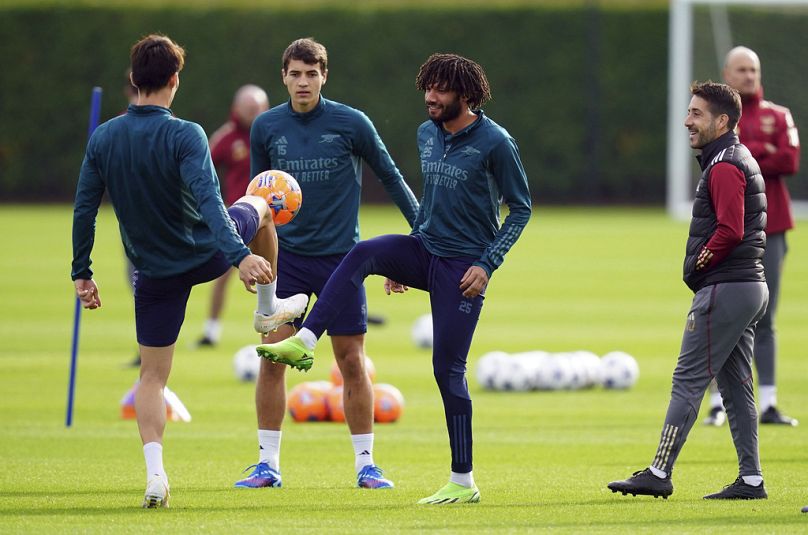 Arsenal's Mohamed Elneny, center, attends a training session at the London Colney Training Centre, Hertfordshire, England, Monday Oct. 23, 2023.