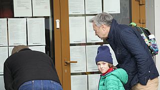 People checking the results of elections in Poland, in which more than 73% of eligible voters took part. October, 2023