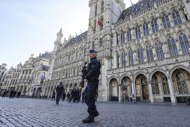 FILE: Belgian police patrol the Grand Place in central Brussels, 17 October 2023