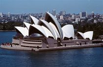 The Sydney Opera House is seen with Sydney Harbor in the background, in March 1986