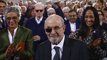 Author Salman Rushdie acknowledges applause as he receives the Peace Prize of the German book trade