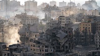 Destruction from Israeli aerial bombardment is seen in Gaza City on Wednesday