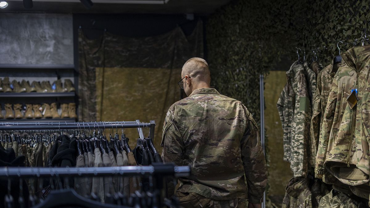 A soldier attends a military shop in Kramatorsk, Ukraine, Wednesday, Sept. 13, 2023.