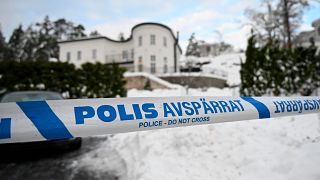 Police tape cordons an area outside a house where Swedish Security Service arrested two people on suspicions of espionage in a predawn operation in Stockholm, November 2022.