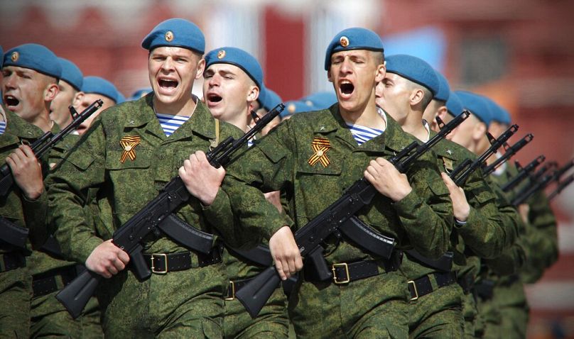 Russian paratroopers march during the Victory Day Parade in Moscow, May 2011