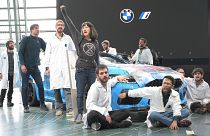 Activists take part in an a non-violent action at a BMW showroom in October last year. 