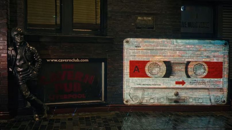 The mysterious cassette tape projected onto the wall of the Cavern Club